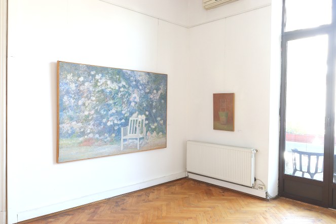 Painting of a beautiful garden, a white chair, and a white dove.